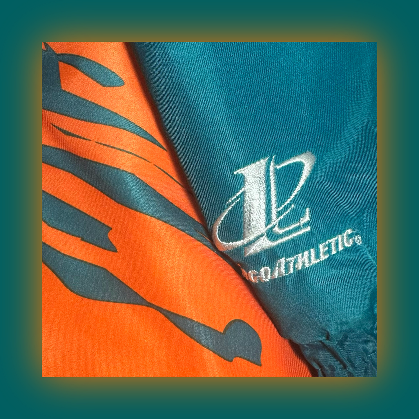 Miami Dolphins Authentic Logo Athletic™️ Splash Puffer Jacket